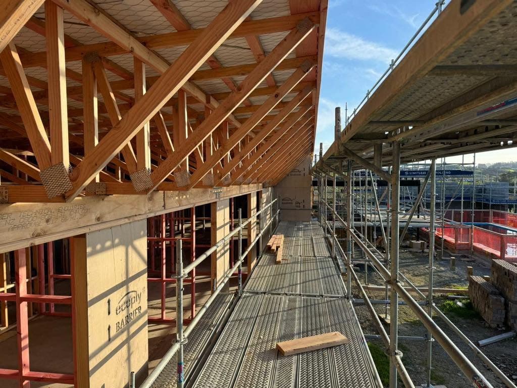 Roof trusses and scaffolding on a framing job